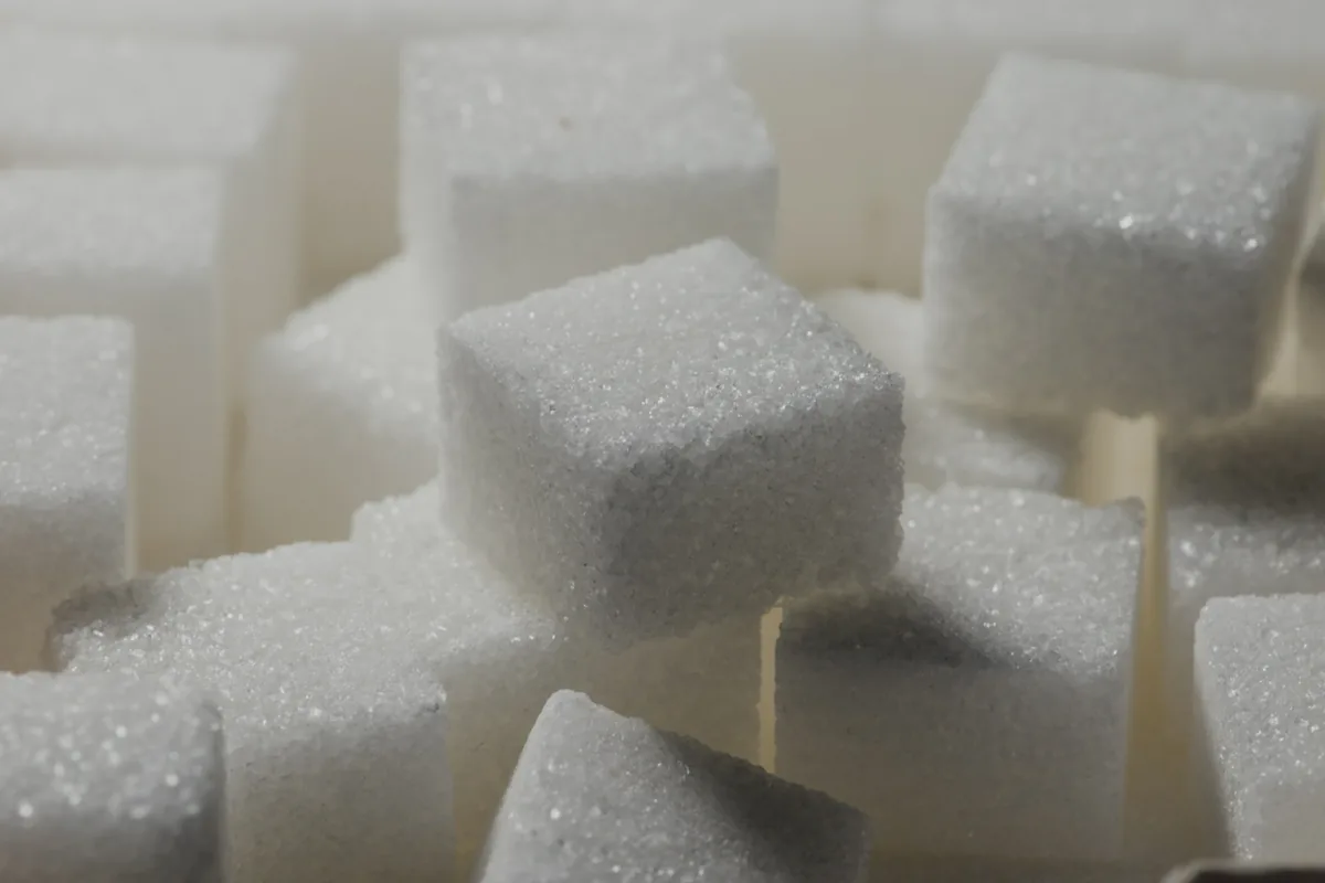 Close-up of a pile of white sugar cubes